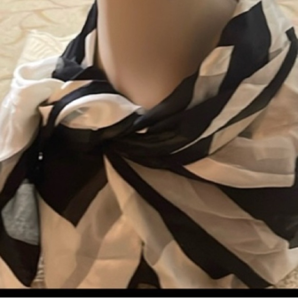 2 vintage scarfs one is silk the other has no label but beautiful pattern